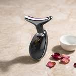 Masseur Brio Hielo version noire avec LED rose et pétales de roses — soin visage premium LED et EMS